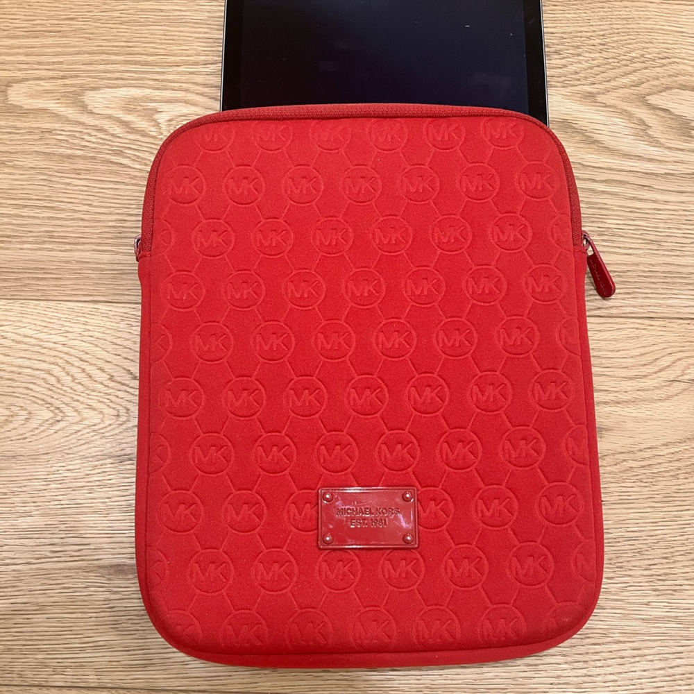 Host pick: Michael Kors red padded tablet case 8”x10.5”